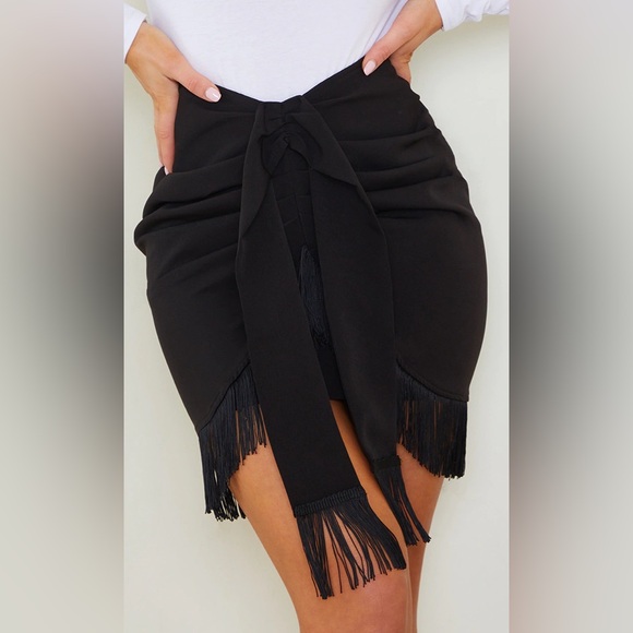 BLACK WOVEN TASSEL WRAP SKIRT - Picture 1 of 6